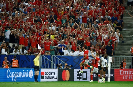 Wales’ Louis Rees-zammit celebrates at the end of the match after a knock on from Fiji’s Semi Radradra.