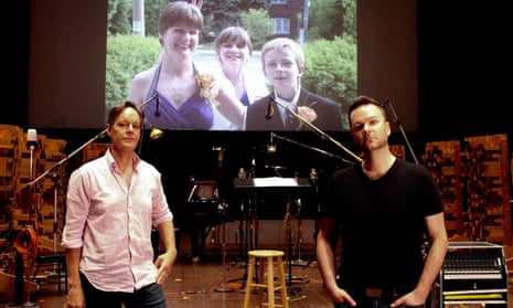 Composer Jake Heggie and baritone Joshua Hopkins, on the scoring stage of Skywalker Sound, with a photo of Hopkins’ sister Nathalie Warmerdam and her two children Valerie and Adrian in the background.