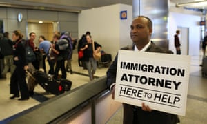 Volunteer immigration attorneys offer to help as people gathered at LAX on 31 January to protest against the travel ban.
