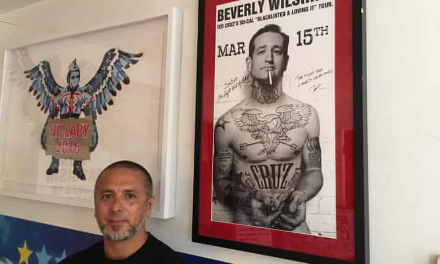 The artist Sabo beside the Ted Cruz poster that made his name.