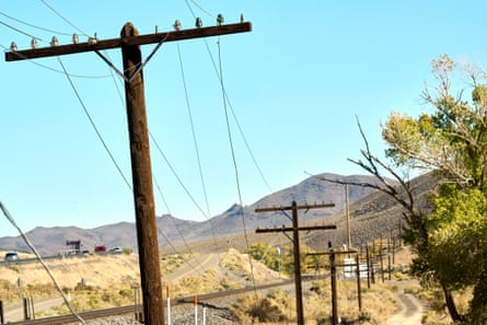 Power lines run along Interstate 80 outside Reno, Nevada.