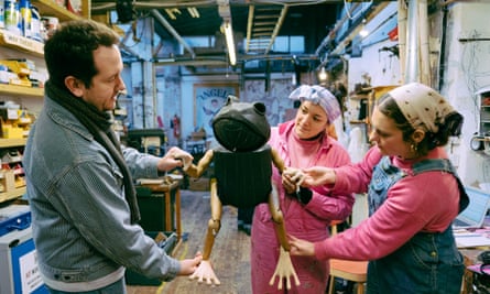 Toby Olié, and puppet makers Daisy Beattie and Beez Barry test out Aogaeru