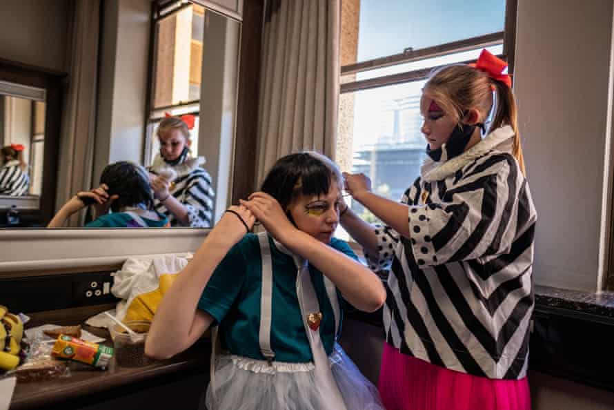 College of Magic students Emilie van den Hooyen and Maelle Oudejans help each other get ready for a performance at the Artscape theatre centre.