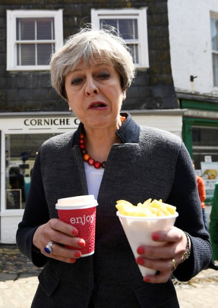 Theresa May does not look like she is enjoying the seaside experience