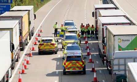 Lorries queue for the Port of Dover along the M20 as police conduct security checks amid the search for Daniel Khalife