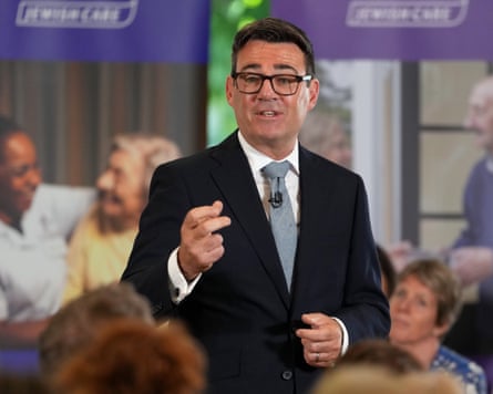 Andy Burnham delivering a speech at a care home