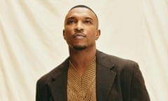 Back on top: Ashley Walters wears suit by prada.com; knitted top by Nick Fouquet (matchesfashion.com).