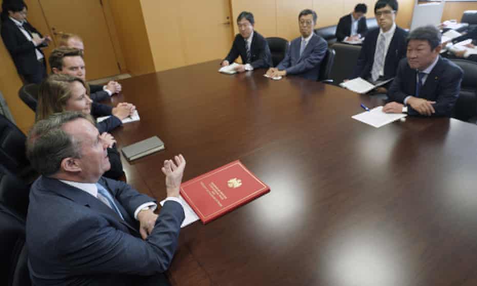 The international trade secretary, Liam Fox, bottom right, meets Japan’s trade minister, Toshimitsu Motegi, far right, in Tokyo last summer