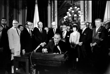 a man signing a document