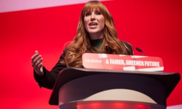 Rayner speaking at the 2022 Labour conference, behind a plinth with a sign reading: 'Labour, a fairer, greener future'