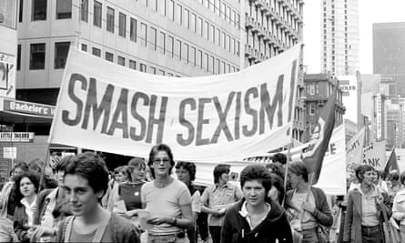 A "smash sexism" banner at an IWD rally