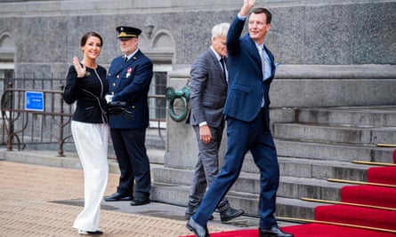 Princess Marie, left, and Prince Joachim, right, arrive at Copenhagen city hall, despite their recent falling out with the queen.