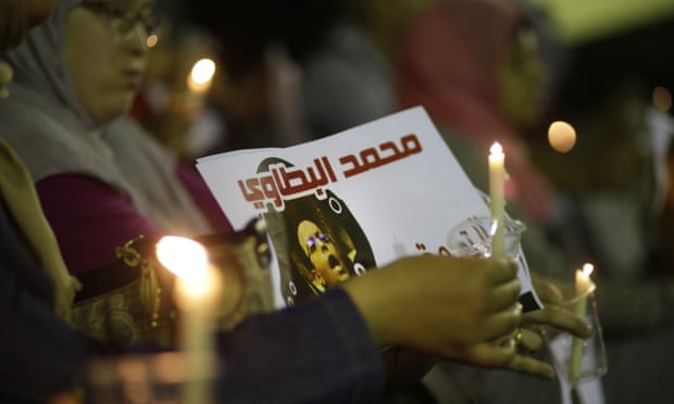 Egyptian journalists demand the release of their colleague Mohammed Al-Battawy in Cairo last week.