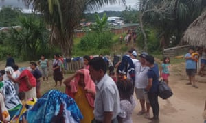 The funeral of a Cacataibo man, Herasmo García, in his village in Huánuco, in Peru’s Amazon region. He was shot dead by unknown assailants. Peru’s indigenous leaders have called for protection after a string of killings by drug gangs seeking land to grow coca under cover of the pandemic.