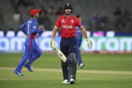 England's Jos Buttler walks from the field after he was dismissed in their T20 match against Afghanistan.