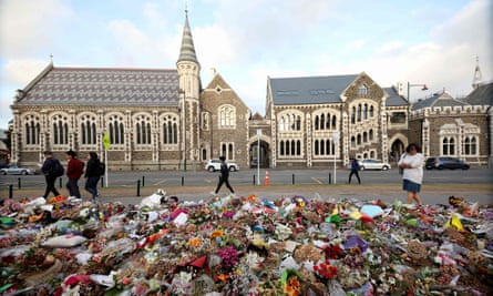 Flowers and tributes displayed in memory of the twin mosque massacre victims outside the Botanical Gardens in Christchurch on March 29, 2019.