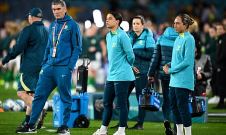 Sam Kerr on the sidelines with Kyah Simon.
