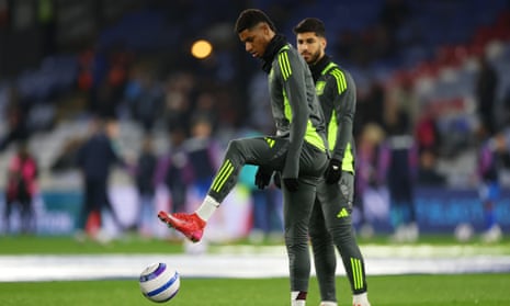 Marcus Rashford and Marco Asensio warm up ahead of kick-off at Selhurst Park.