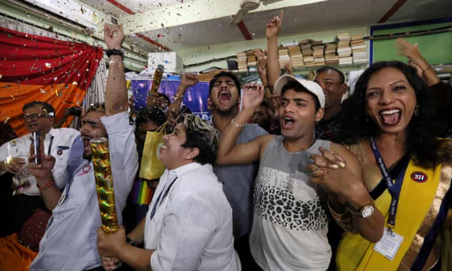 Indian activists celebrate after the hearing.