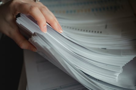 Emily Cook, 26, flips through ballot proofing papers in Wilkes-Barre on Tuesday.