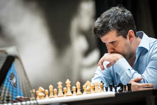 Russia's Ian Nepomniachtchi reacts as China's Ding Liren speaks after their  tiebreaker of FIDE World Chess Championship in Astana, Kazakhstan, Sunday,  April 30, 2023. China's Ding Liren defeated Russia's Ian Nepomniachtchi in