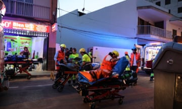 Emergency services evacuate the injured on the beach of Palma de Mallorca, Balearic Islands