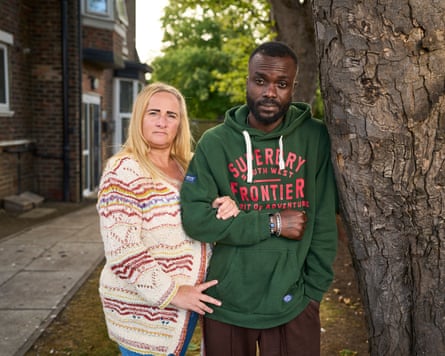Olajuwon and Natalie Ayeni posing for a picture in a street