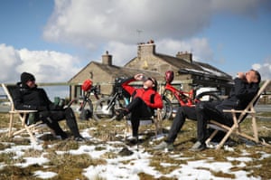 Drinking in deckchairs on snowy ground