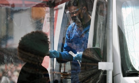 A person is tested at a Covid in Times Square, New York City.