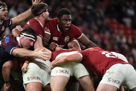 Maro Itoje roars as he is caught in the middle of a driving maul against Queensland Reds in Brisbane.