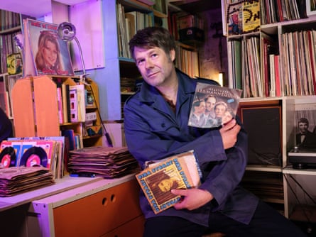 Patrice Caillet photographed in his basement in Montreuil near Paris where he keeps his records.