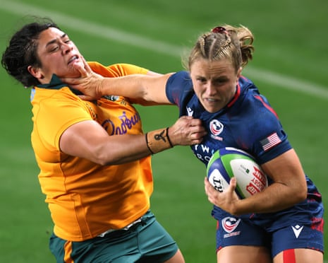 Cassidy Bargell runs the ball for the USA Women's Eagles ahead of Australia Wallaroos' Eva Karpani during the Pacific Four Series match in Kansas City