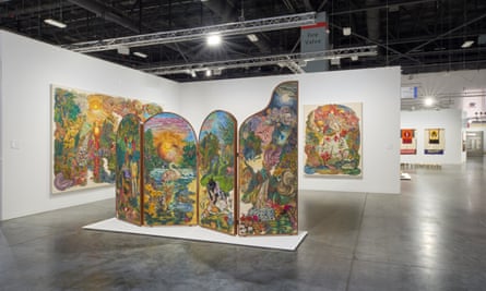 image of an art gallery featuring a fantastical colored folding screen in the center