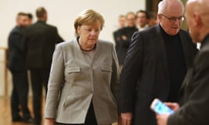 German chancellor Angela Merkel and CDU Bundestag leader Volker Kauder at the coalition talks on Sunday.