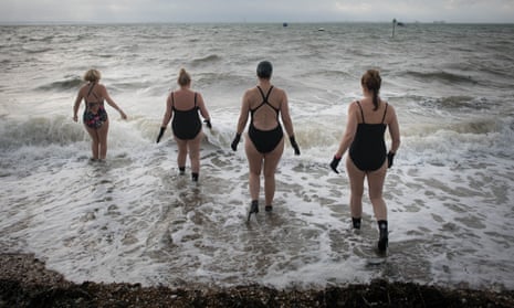 Swimmers enter the sea