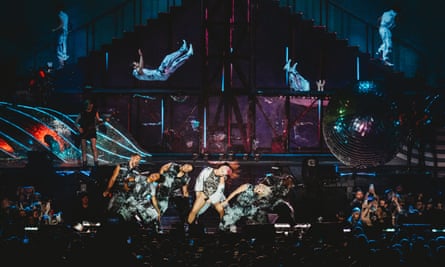 Putting on a show: Pink with her dancers and band in Sydney on Friday night.