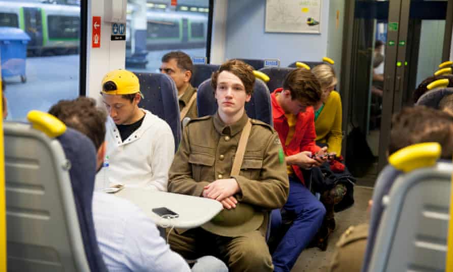 A soldier takes the train from Euston to Milton Keynes.