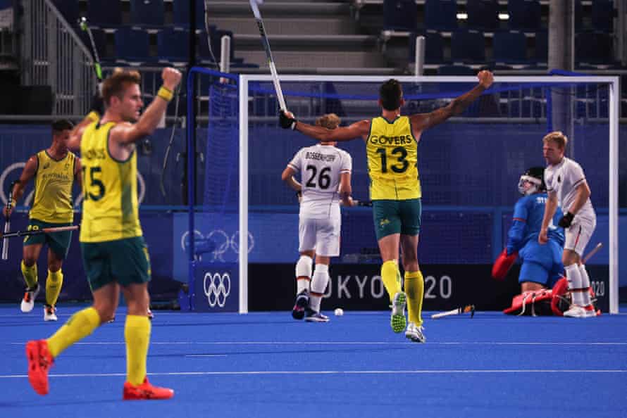 Australia celebrate taking a 1-0 lead during the hockey.