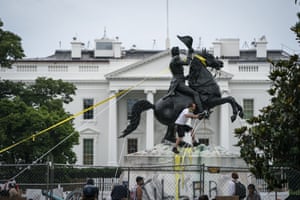 Protesters attempt to pull down the statue of Andrew Jackson in Lafayette Square near the White House.