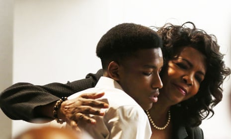 Dallas county district attorney Faith Johnson hugs Kevon Edwards, the older brother of Jordan Edwards, during the trial. 
