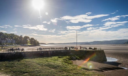 The village of Arnside with its pier on the River Kent estuary in Cumbria