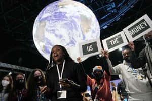 Climate activist Vanessa Nakate engages in a ‘Show US The Money’ protest