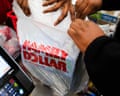 a man checking out at Family Dollar register in Windsor, North Carolina