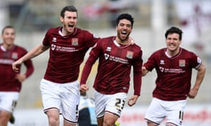 Northampton Town celebrate Danny Rose’s winner against Wycombe that sent the club 10 points clear at the top of League Two.