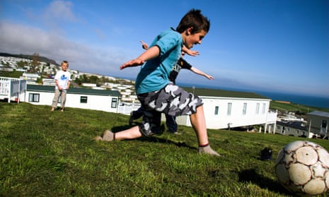 Children on holiday at a caravan park in Devon, UK.C4X2BX Children on holiday at a caravan park in Devon, UK.