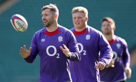 England’s Elliot Daly (left) reacts during a training session.