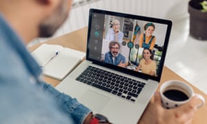 Man has an online meeting with his employees