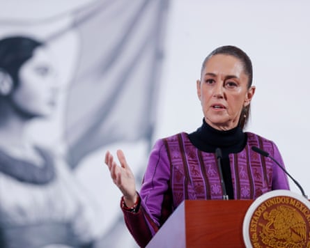 Claudia Sheinbaum gestures from a podium.