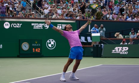 Carlos Alcaraz celebrates after defeating Daniil Medvedev to win the Indian Wells title.