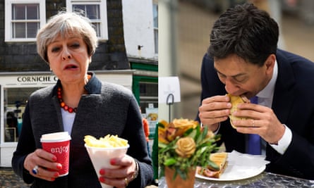 Theresa May struggles with chips while Ed Miliband struggles with a bacon sandwich